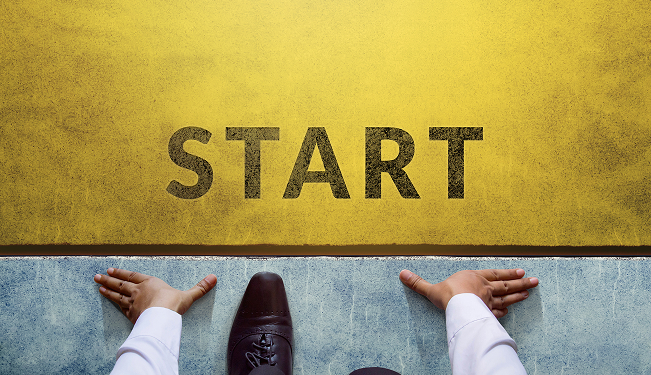 High school senior researching student loans on a laptop