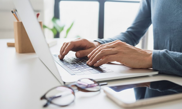 GradBridge employees in a team meeting